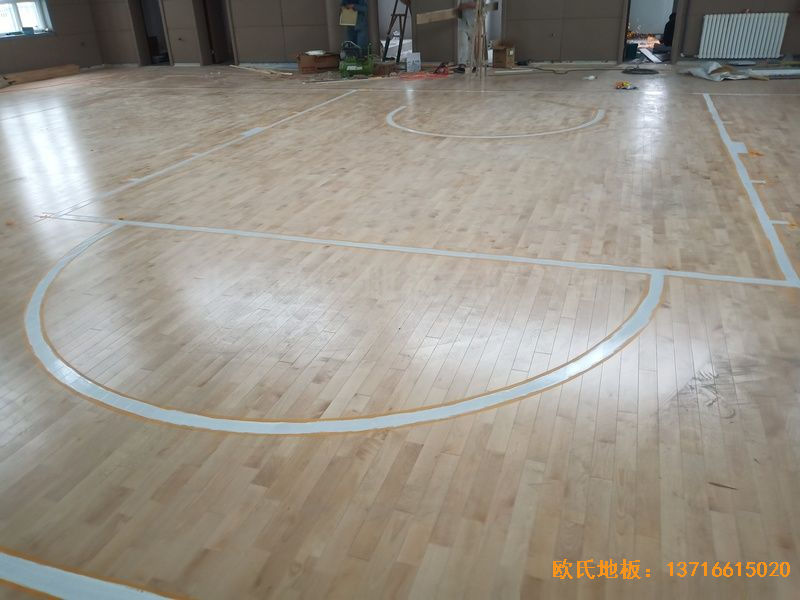 新疆克拉玛依市独山子虹园小区体育馆体育木地板铺设案例
